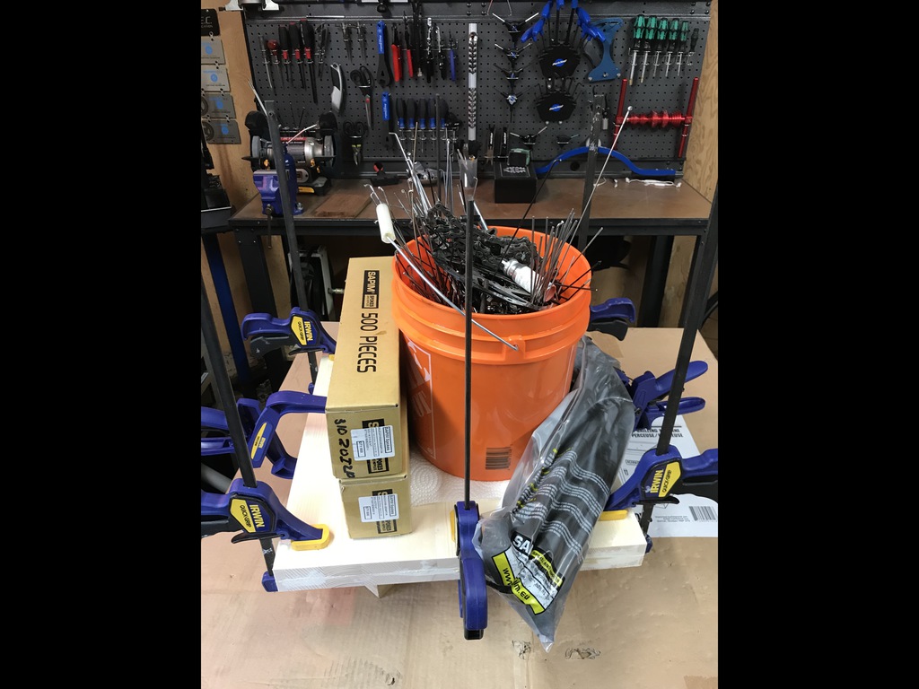 Clamped and weighted to cure