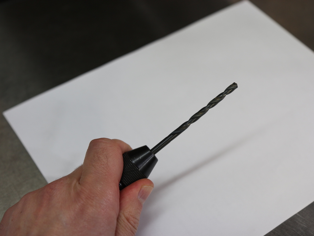 Handheld drillbit